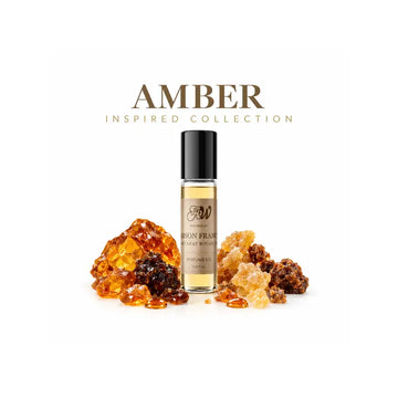 Luxury amber perfume oil collection featuring Ancient Wellness perfume oil bottle surrounded by glowing amber, vanilla, and rich woody accords.
