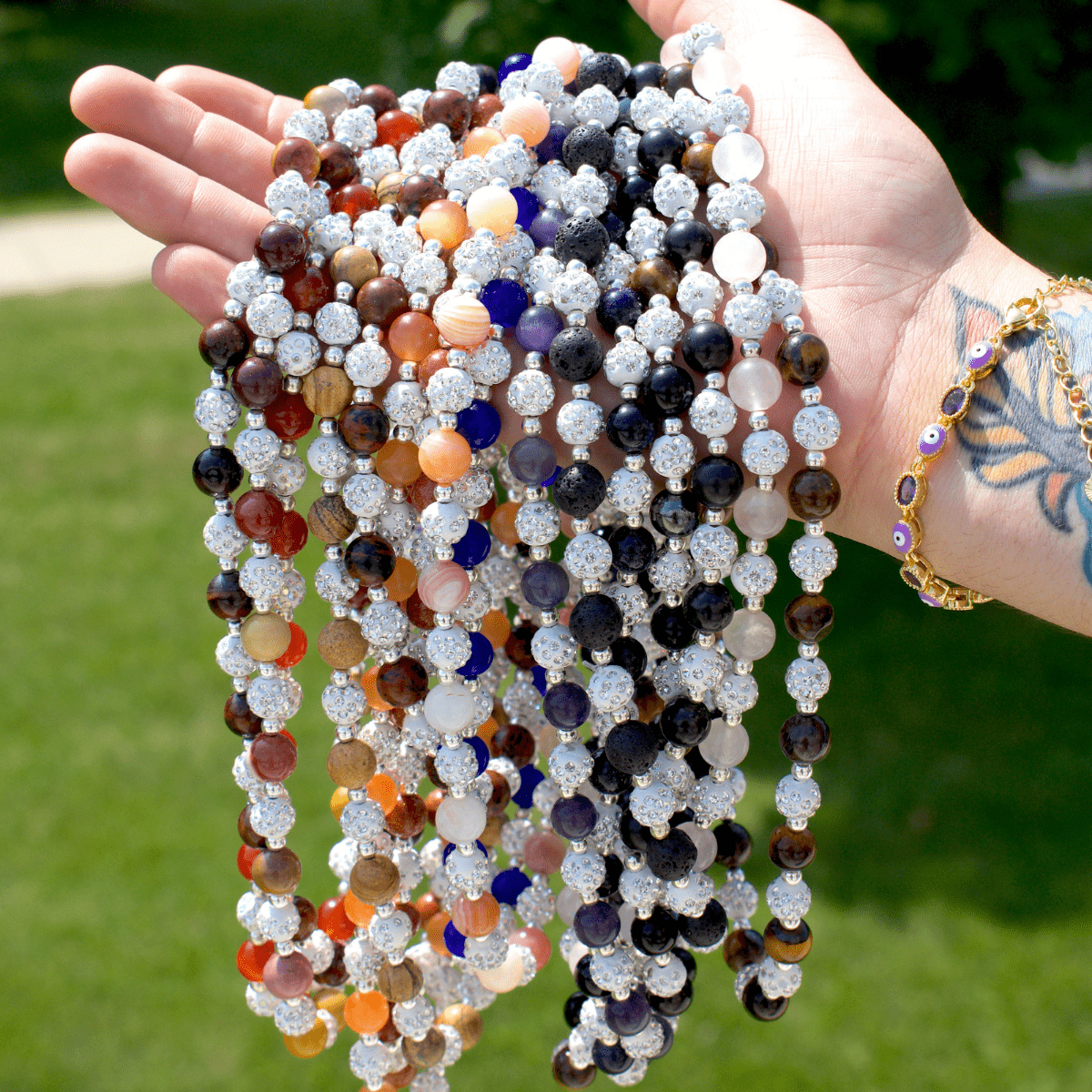 Custom beaded crystal necklaces collection from Ancient Wellness, featuring handcrafted necklaces with healing crystals like rose quartz, selenite, and tiger's eye.