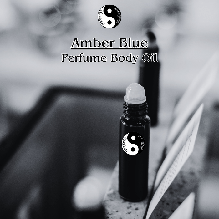 Amber Blue Uncut and Pure Perfume Body Oil by Ancient Wellness - A luxurious and captivating fragrance with citrus, floral, amber, and musky notes.