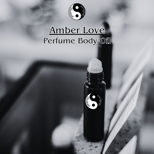 Amber Love Uncut and Pure Perfume Body Oil by Ancient Wellness - A romantic and captivating fragrance with citrus, floral, amber, and creamy vanilla notes.