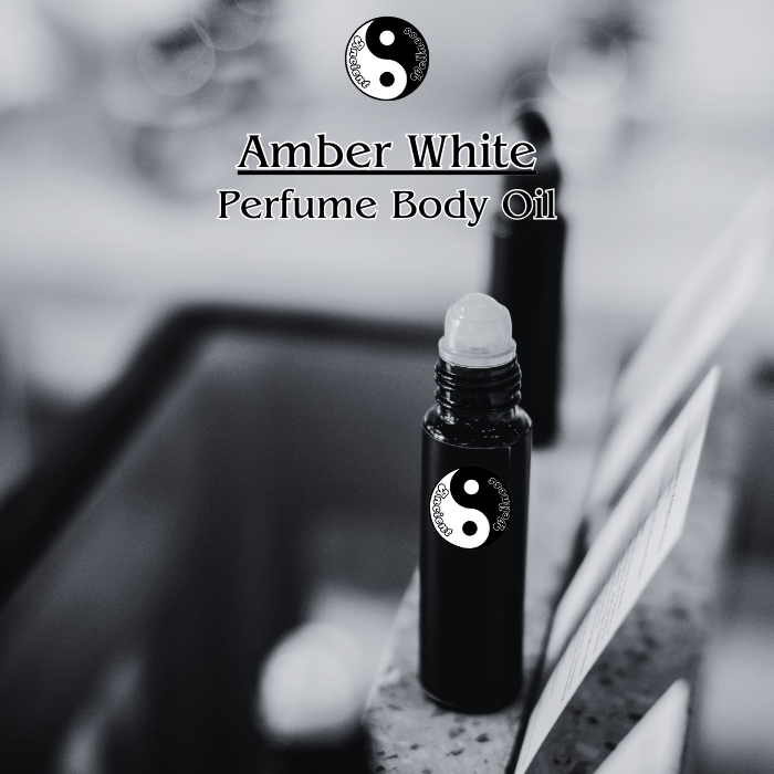 Amber White Uncut and Pure Perfume Body Oil by Ancient Wellness - A soft and elegant fragrance with citrus, amber, powdery musk, and sandalwood notes.