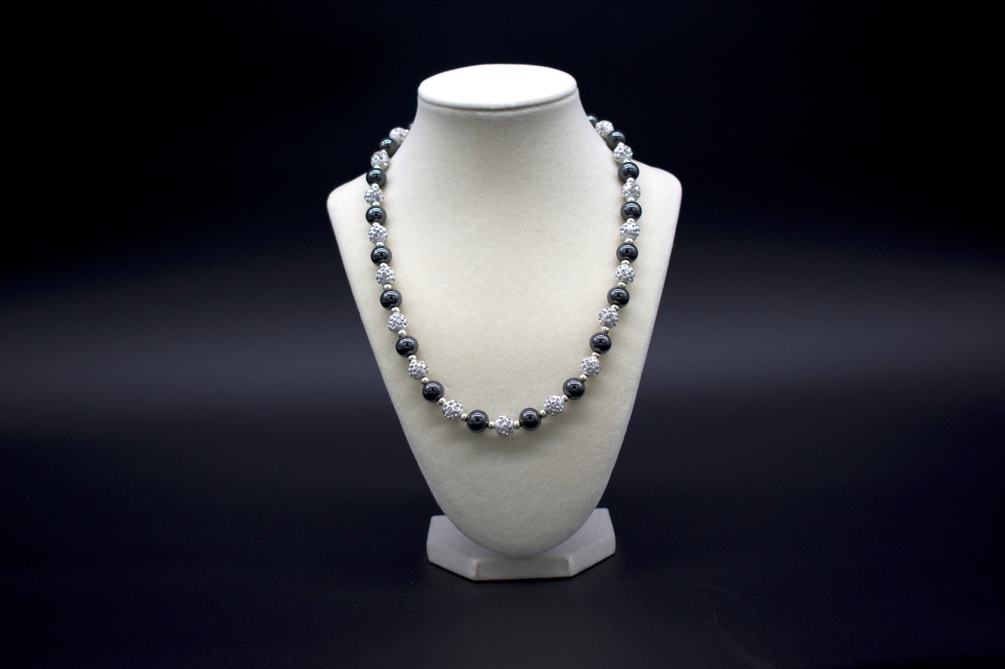 Custom beaded hematite necklace from Ancient Wellness, handcrafted with genuine hematite crystals, symbolizing grounding, protection, and balance, suitable for both men and women.