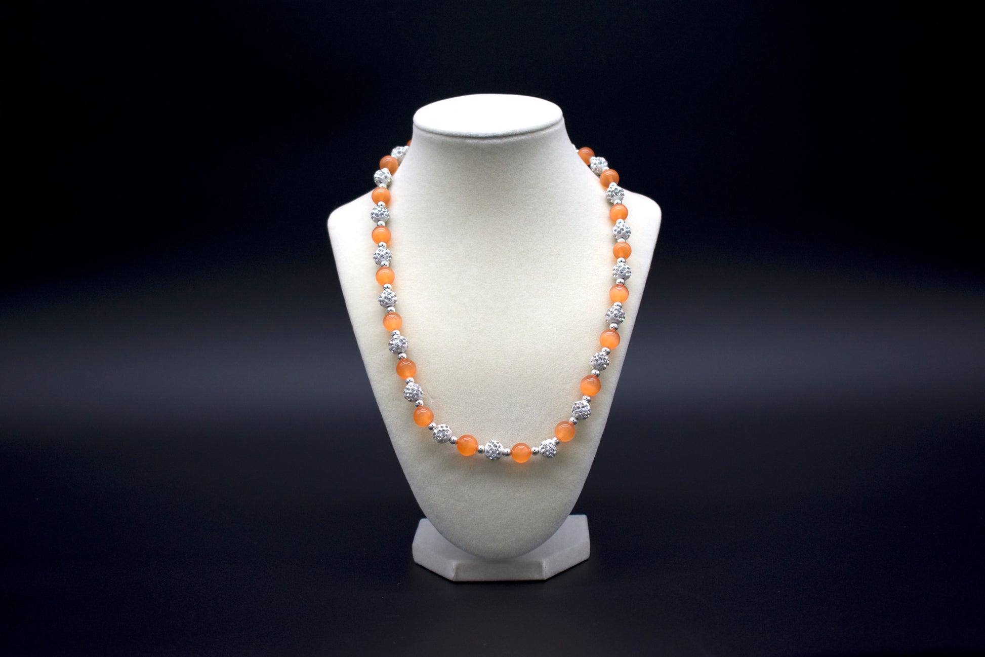 Custom beaded orange cat’s eye necklace from Ancient Wellness, handcrafted with genuine orange cat’s eye crystals, symbolizing vitality, creativity, and protection, suitable for both men and women.