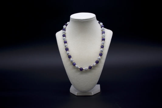 Custom beaded purple cat’s eye necklace from Ancient Wellness, handcrafted with genuine purple cat’s eye crystals, symbolizing intuition, protection, and spiritual awareness, suitable for both men and women.