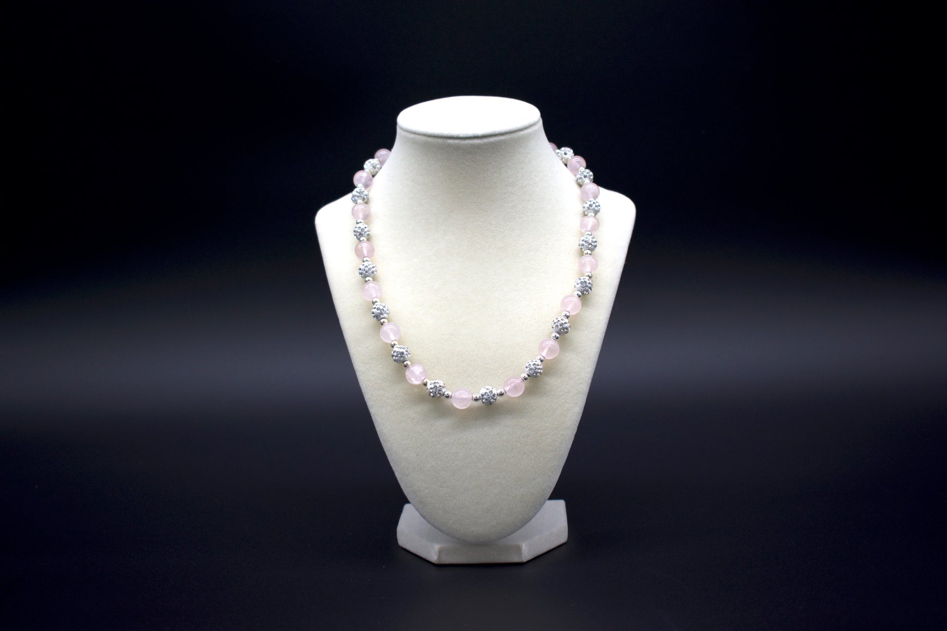 Custom beaded rose quartz necklace from Ancient Wellness, handcrafted with genuine rose quartz crystals, symbolizing love, compassion, and emotional healing, suitable for both men and women.