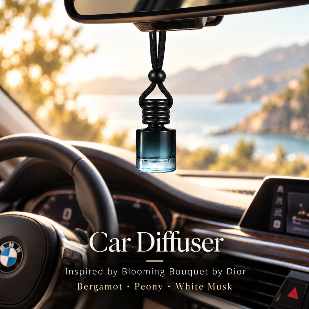 Blooming Bouquet Inspired by Dior car diffuser hanging in a BMW interior with Bergamot, Peony, White Musk notes