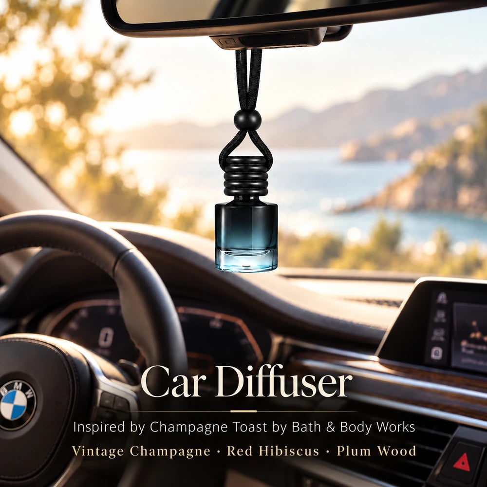Champagne Toast Inspired by Bath & Body Works car diffuser hanging in a BMW interior with Vintage Champagne, Red Hibiscus, Plum Wood notes