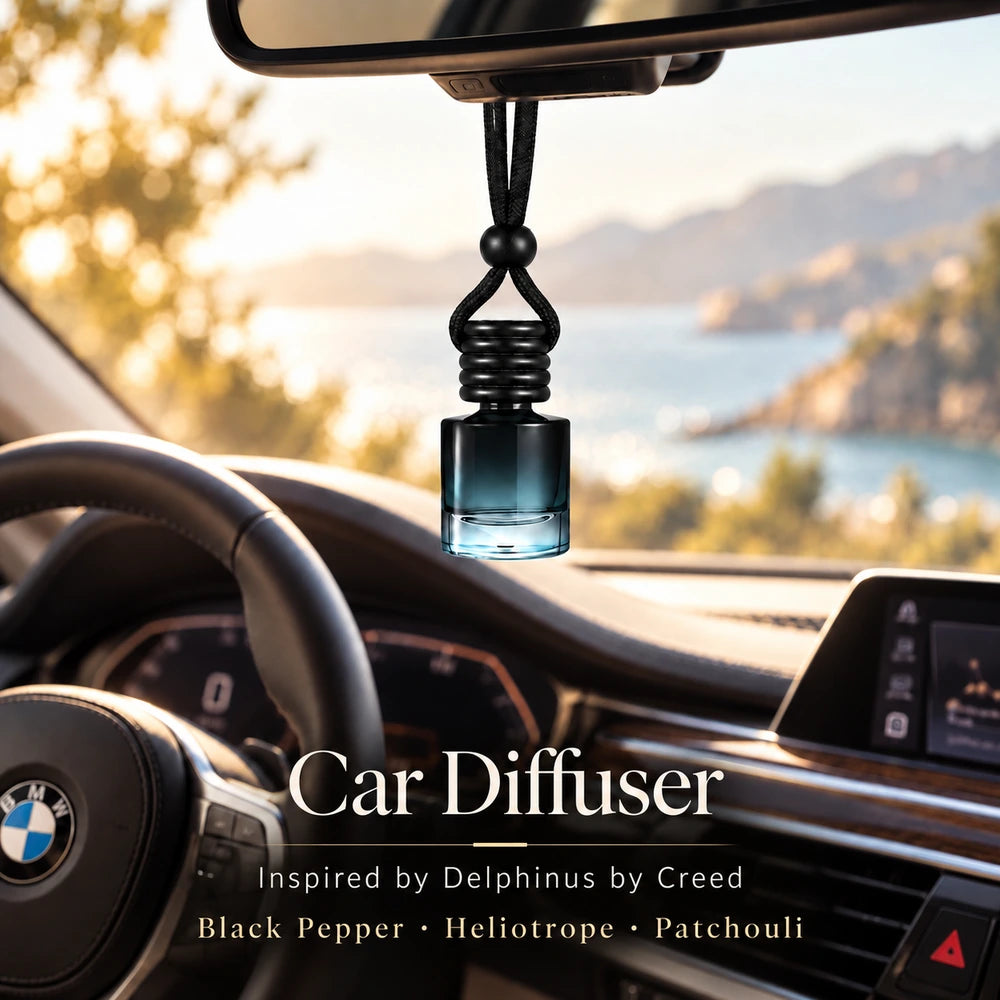 Ancient Wellness Delphinus car diffuser hanging from a rearview mirror in a BMW interior