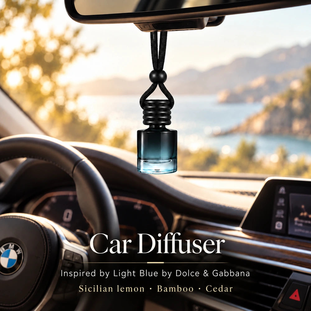 Light Blue Inspired by Dolce & Gabbana car diffuser hanging in a BMW interior with Sicilian lemon, Bamboo, Cedar notes