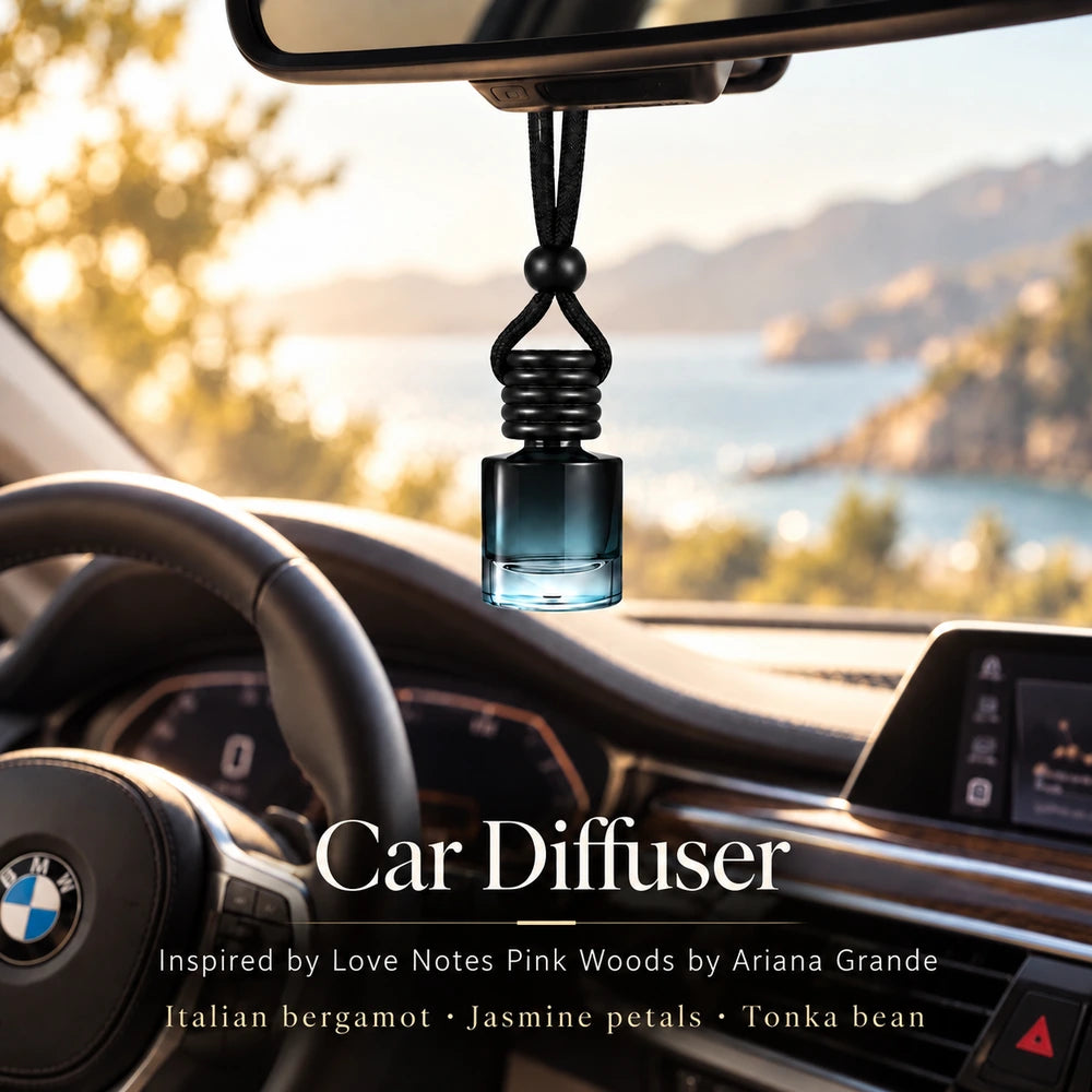 Love Notes Pink Woods Inspired by Ariana Grande car diffuser hanging in a BMW interior with Italian bergamot, Jasmine petals, Tonka bean notes