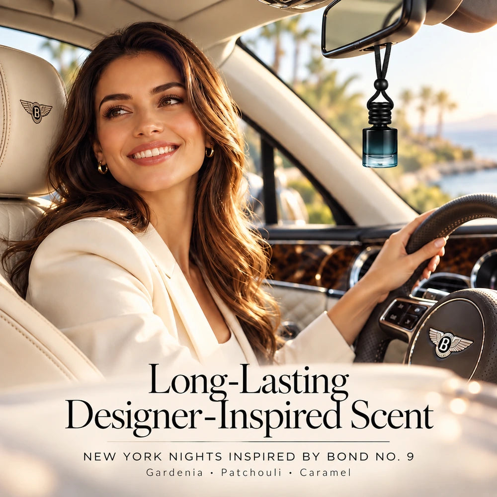 Smiling woman in a Bentley-style interior with an Ancient Wellness New York Nights car diffuser hanging from the mirror
