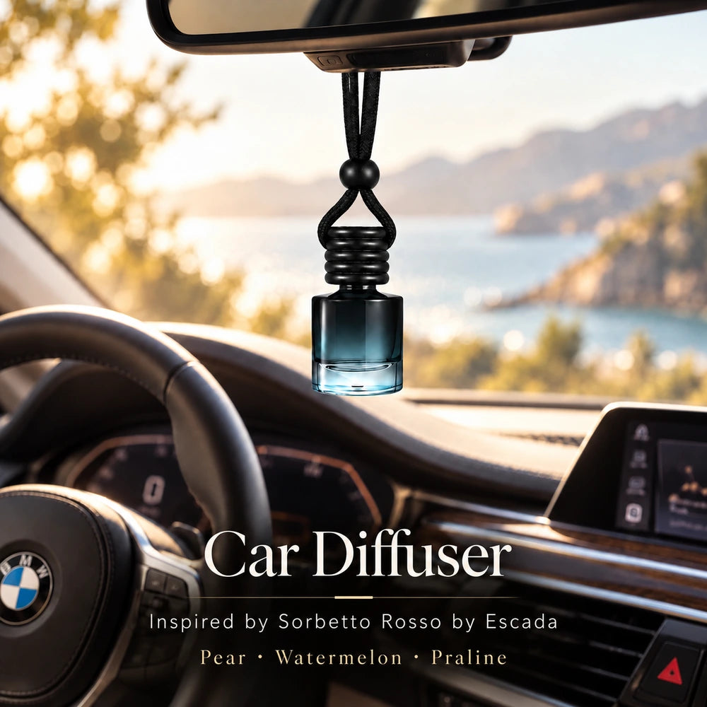 Sorbetto Rosso Inspired by Escada car diffuser hanging in a BMW interior with Pear, Watermelon, Praline notes