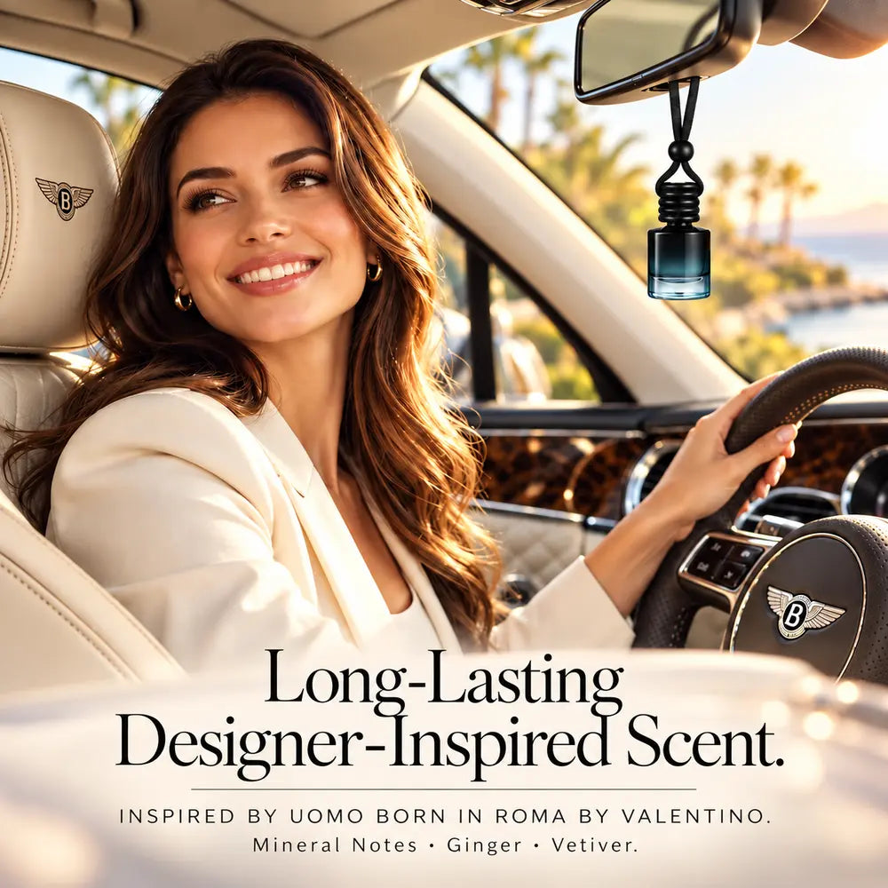 Uomo Born In Roma Inspired by Valentino car diffuser hanging in a luxury car beside a smiling woman with mineral notes, ginger and vetiver notes